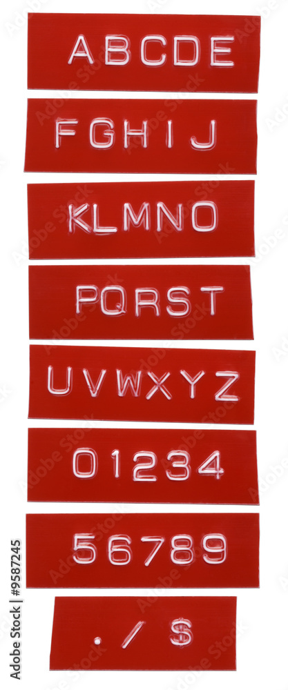 punch letter alphabet on red labeling tape Stock Photo