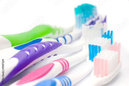 five toothbrushes multicolored