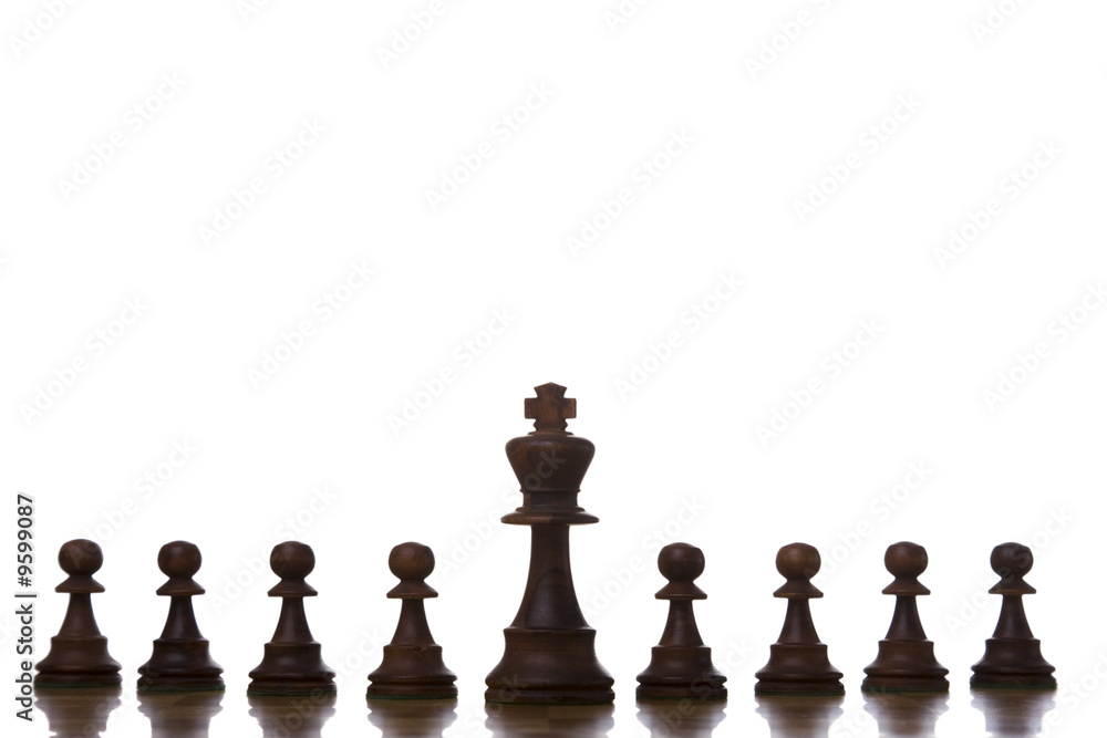 the king piece of a chess table ready for it's move the king piece of a chess table ready for it's move