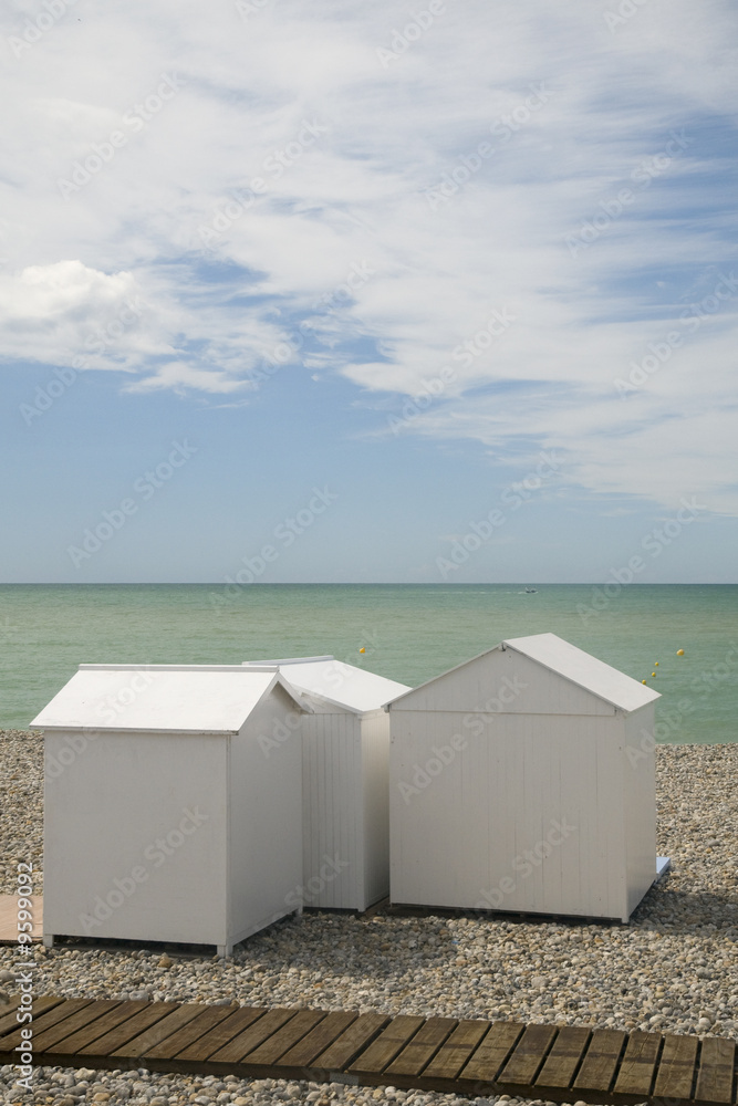 White cabins at the beach