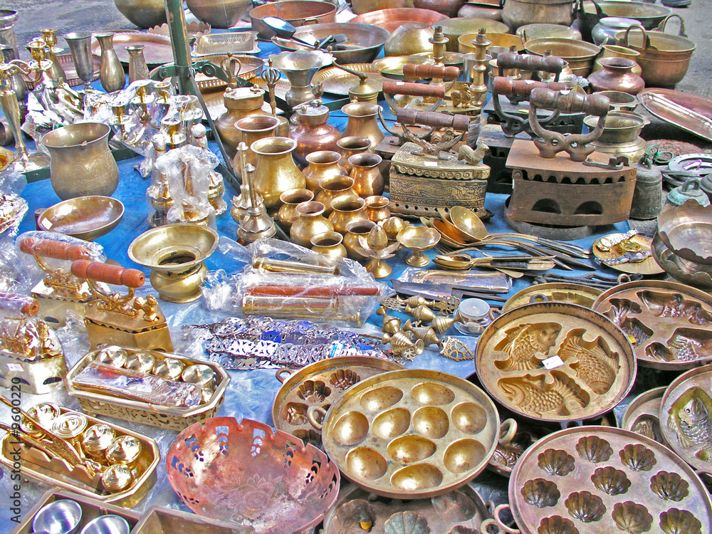 Assortments of antique and new brass wear at flee market