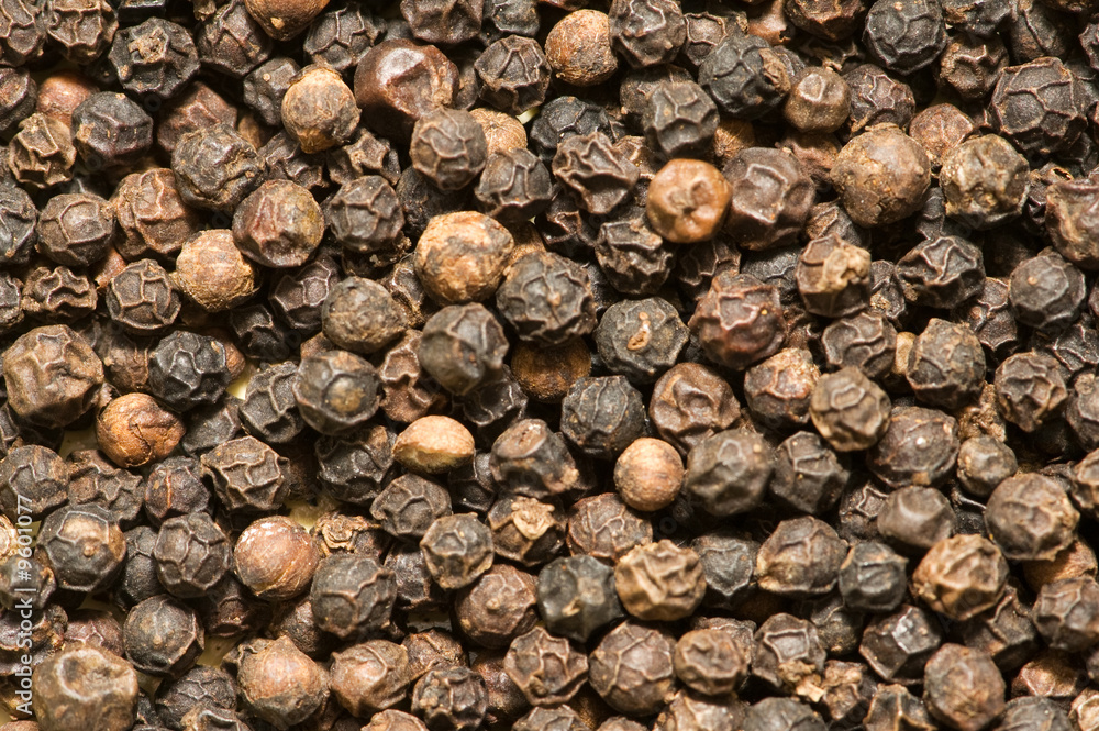 Background of black pepper - extreme close up Background of black pepper - extreme close up