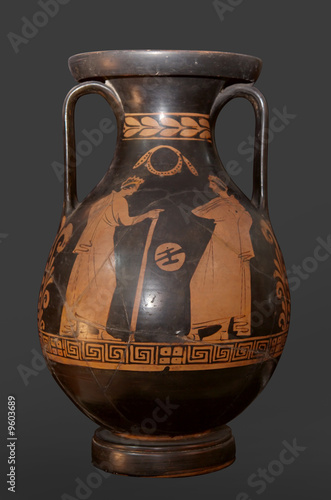 Ancient greek vase isolated on dark background