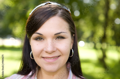 Wallpaper Mural attractive brunette woman in park Torontodigital.ca