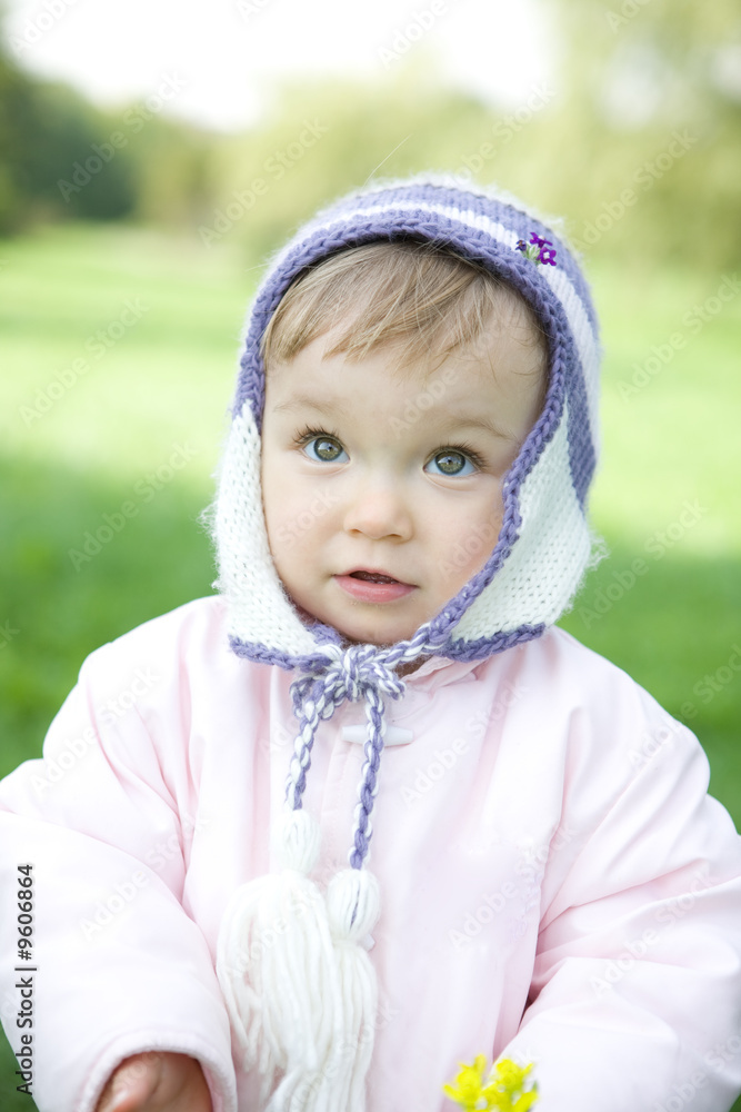 portrait of sweet baby girl in park portrait of sweet baby girl in park