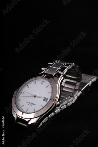 pachshot of a silver watch photo