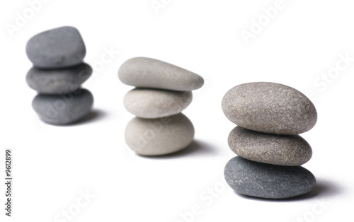 Stack of balanced stones on white
