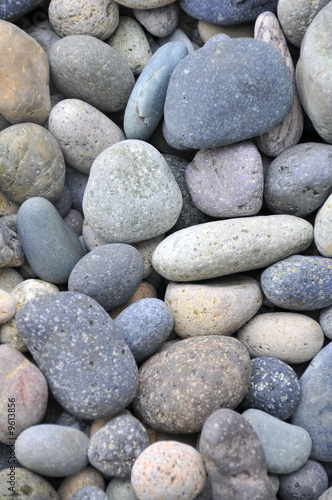 Texture of smooth rocks on sea shore