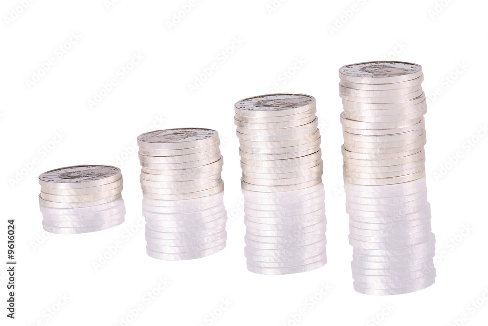 Stack of pure silver coins lineduponwhitewith reflections Stack of pure silver coins lineduponwhitewith reflections