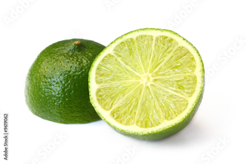 Lime, cut in half, isolated on white with natural shadow.