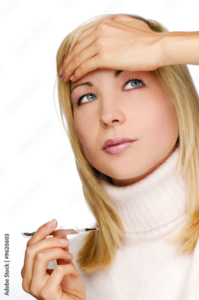 Obraz premium young woman checking temperature close up shoot