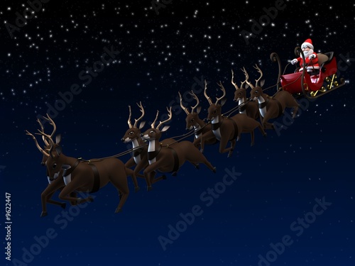 weihnachtsmann mit schlitten und rentieren photo