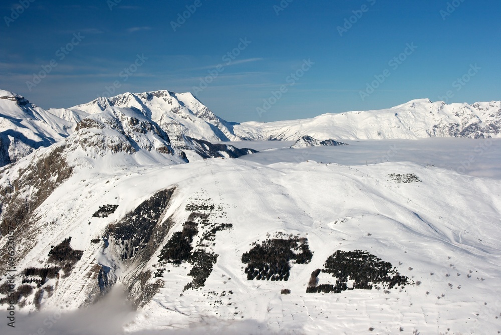 High mountain range covered by snow