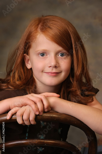 Portrait of a little red headed girl