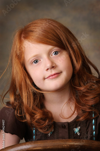 portrait of a little red headed girl