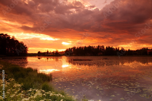 Lake at sunset with reflection in Finland