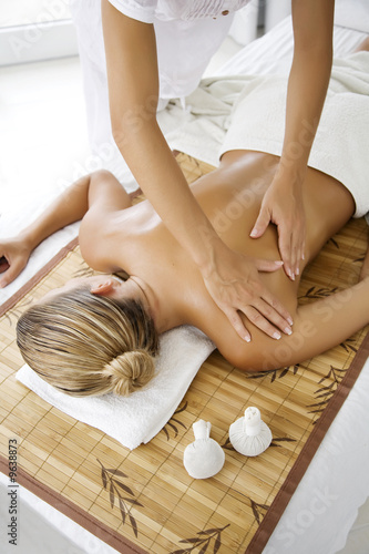female receiving professional massage #9638873