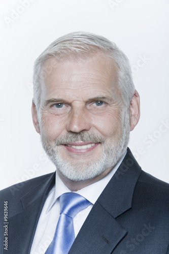 expressive portrait of a handsome senior businessman