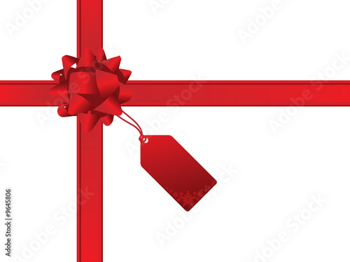 Red christmas bow with gift tag