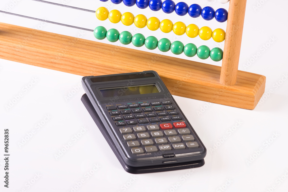 abacus and calculator isolated on white background abacus and calculator isolated on white background