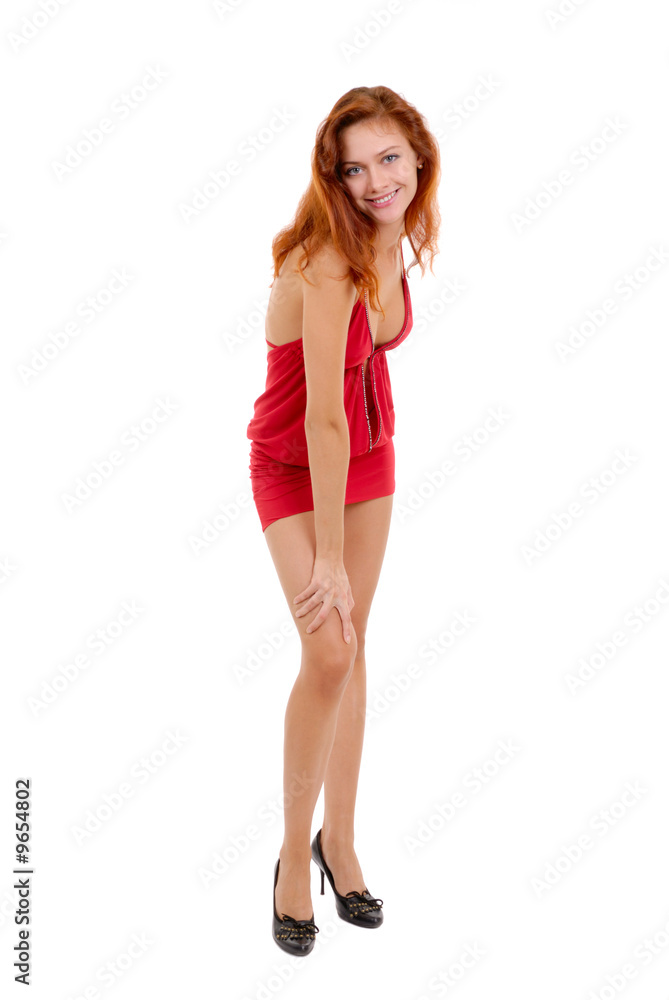 Beautiful redheaded girl posing in studio on white background Beautiful redheaded girl posing in studio on white background