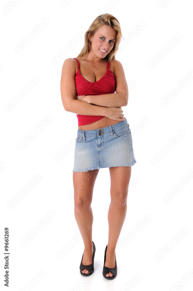 Young woman dressed in casual clothing standing Young woman dressed in casual clothing standing