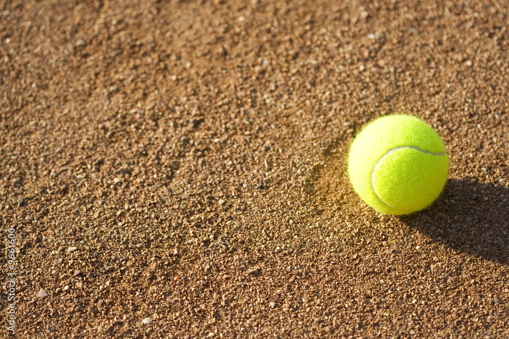 Tennis ball on sport background