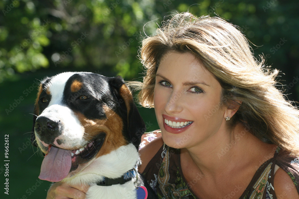 woman with her swiss mountain dog having fun woman with her swiss mountain dog having fun