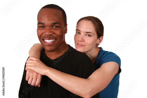 Beautiful multi ethnic couple on pure white background