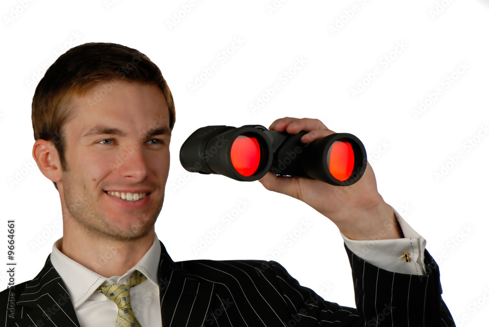 businessman looks in field-glass on white background businessman looks in field-glass on white background
