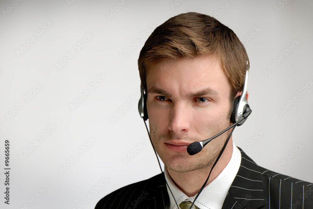 businessman in headphones speaks on microphone businessman in headphones speaks on microphone