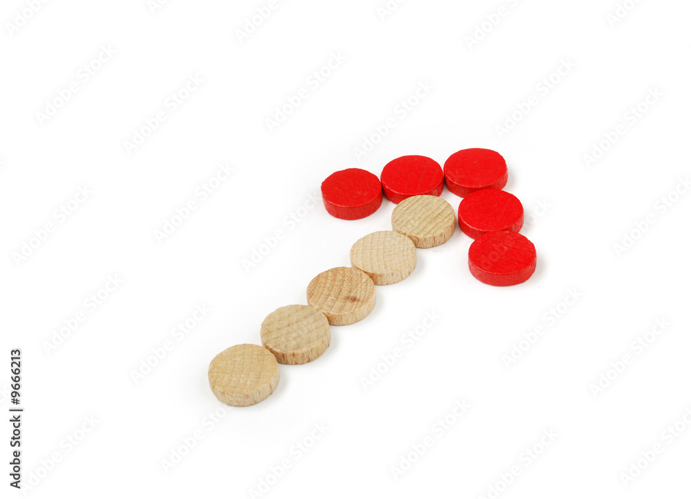 Arrow up symbol made from wooden chips