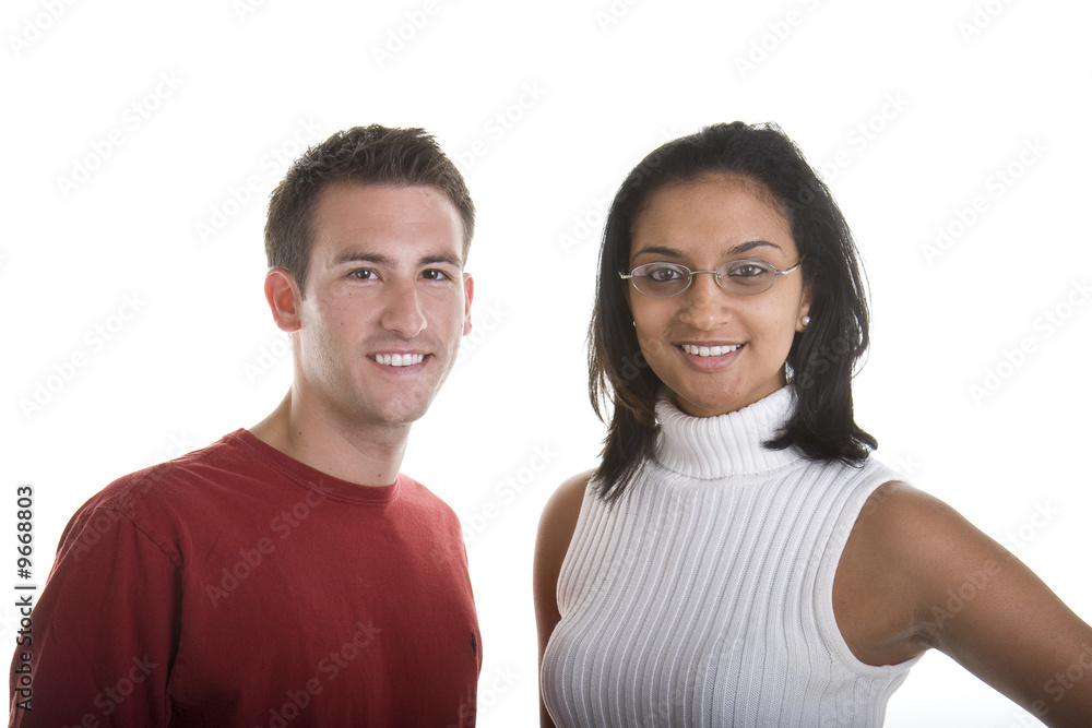 A culturally diverse young couple smiling for the camera A culturally diverse young couple smiling for the camera