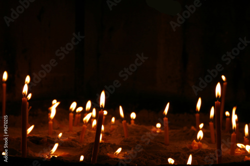 very romantic candles background in the church
