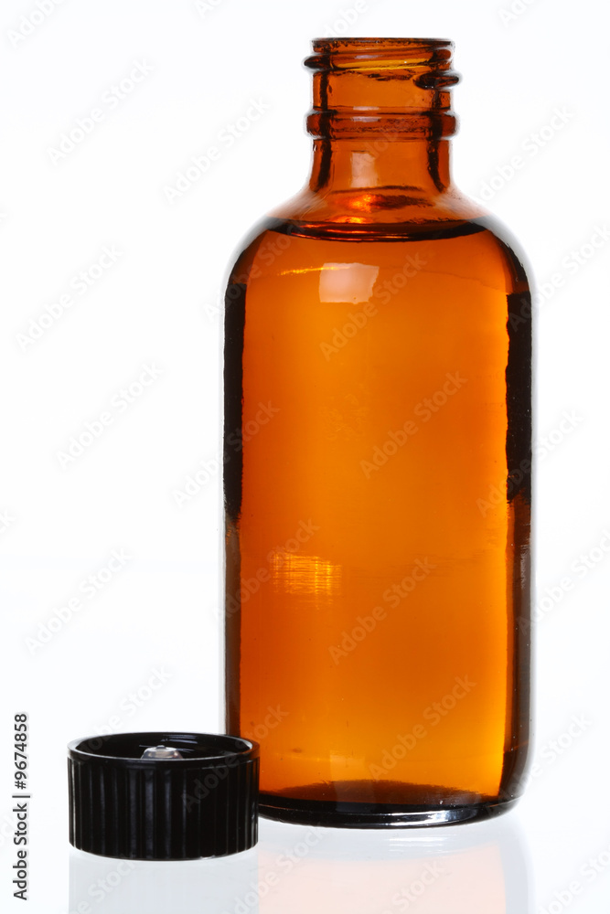 Generic Brown Glass Bottle, Cap Off, Against White Generic Brown Glass Bottle, Cap Off, Against White