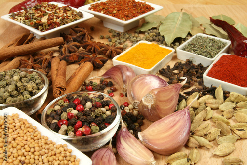 Fotografie Spices, herbs and vegetables. Colorful natural food ingredients.