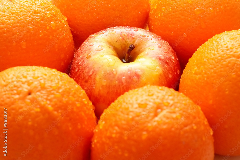 Apples and oranges isolated on a white background Apples and oranges isolated on a white background