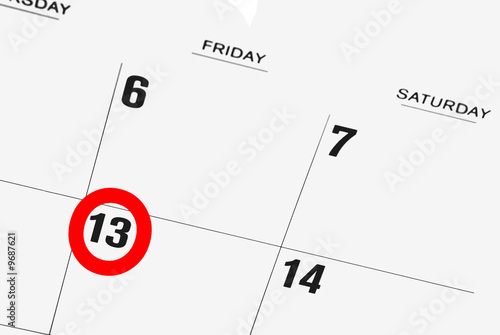 calendar with friday the thirteenth circled in red photo