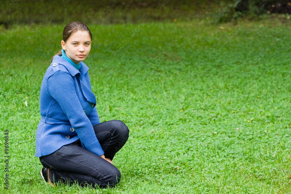 Beautiful young woman with blue coat outdoors Beautiful young woman with blue coat outdoors