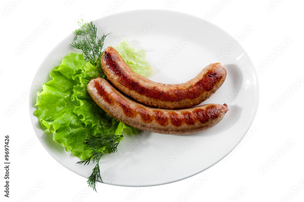 grilled sausage with lettuce isolated on white grilled sausage with lettuce isolated on white