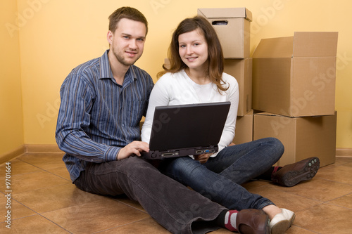 casual couple moving in new home