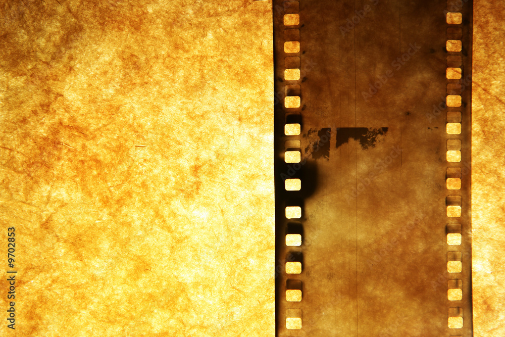 Old film strip over grunge paper background Old film strip over grunge paper background