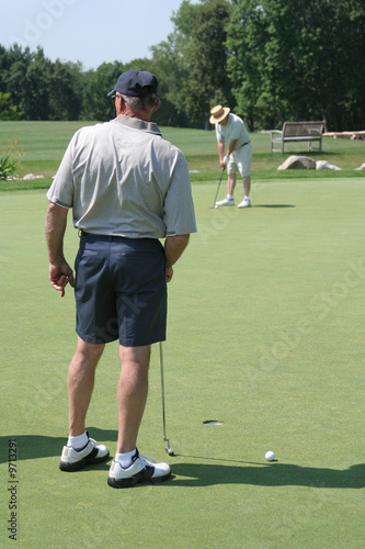 Active Seniors at Golf Practice Green