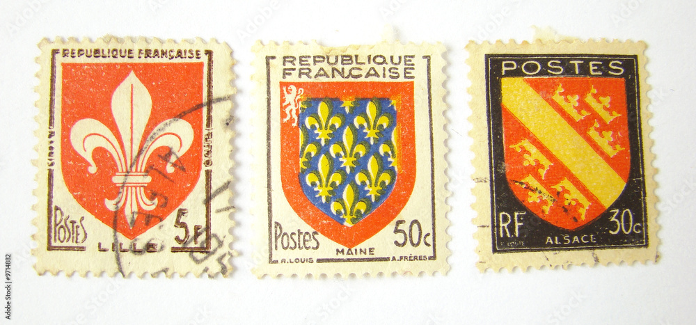 Set of 3 postage stamps from France on white background