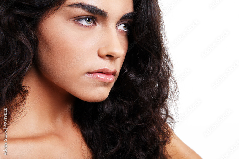 Fototapeta premium Cute young girl posing on white background. Isolated.