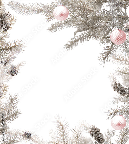 Silver Christmas tree branches with baubles forming a frame