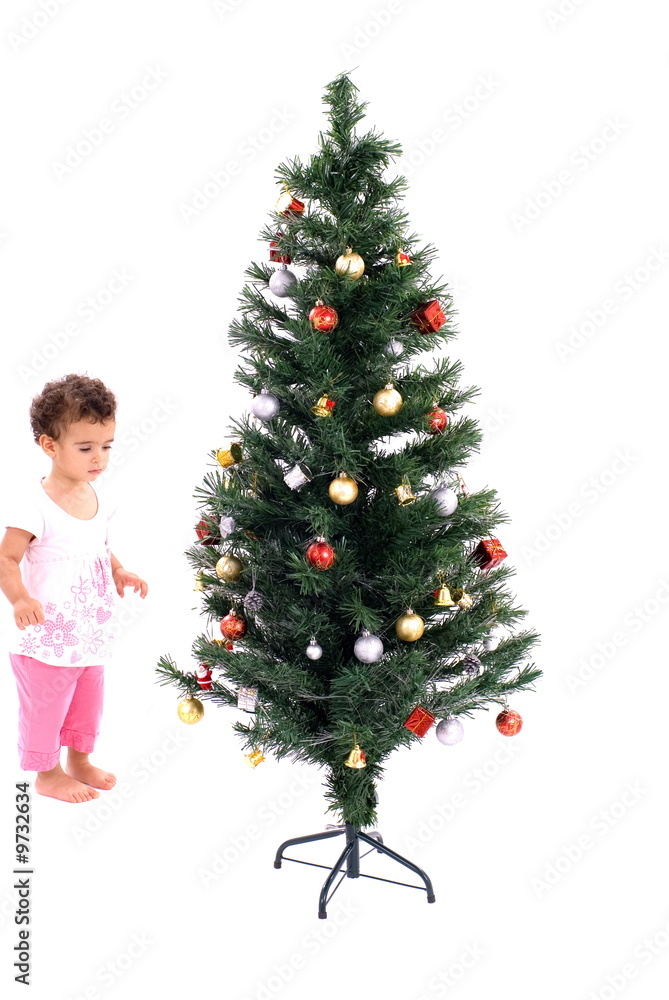 Little Child Looking a Christmas Tree .