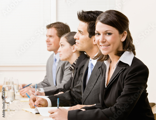 Co-workers in meeting in conference room