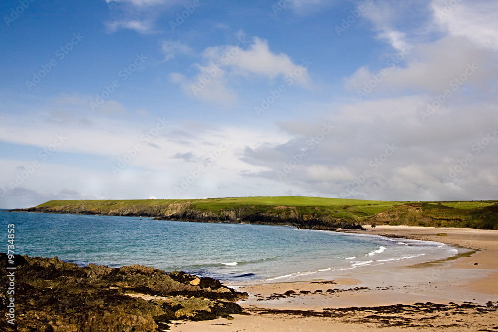 A beautiful beach in a sandy cove A beautiful beach in a sandy cove