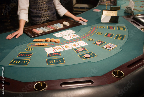 close-up view of a poker playing table in casino photo